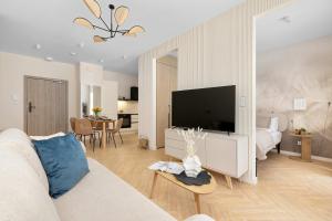 Rodzinny Apartament z Klimatyzacją i Parkingiem Blisko Parku Zdrojowego by Noclegi Renters
