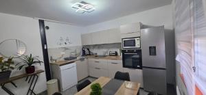 Maison avec jardin et parking privé - proche centre