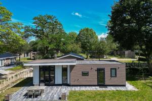 Stijlvol 4-persoons chalet in Betuwe, Zennewijnen
