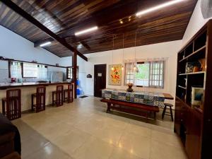 Linda casa confortável e tranquila ao lado da praia de Itamambuca , Pet friendly