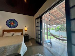 Linda casa confortável e tranquila ao lado da praia de Itamambuca , Pet friendly