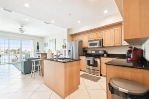 Waterfront 4-level Townhome with Rooftop Deck!