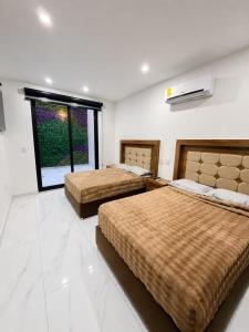 Casa Moderna y Patio Privado a 5 min de El Parián
