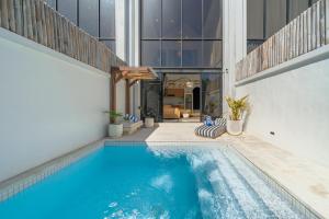 Garita - New Sleek 2BR Canggu Villa, 10 Mins to Beach Life!