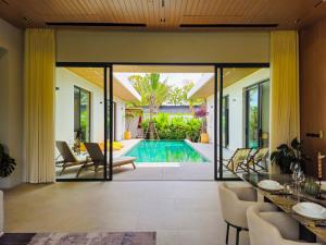 Modern Luxury 4BR Pool Villa by the Sea E1