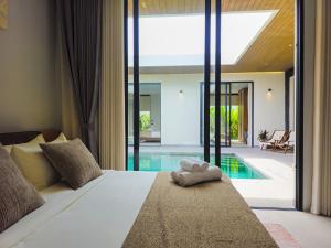 Modern Luxury 4BR Pool Villa by the Sea E1