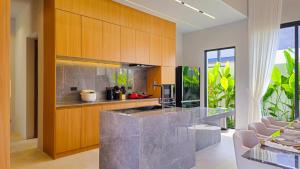 Modern Luxury 4BR Pool Villa by the Sea D1