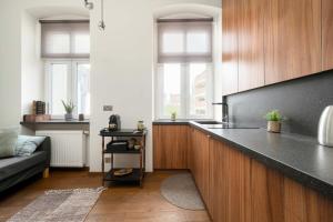 Cozy Apartment on the Main Square in Wrocław by Noclegi Renters