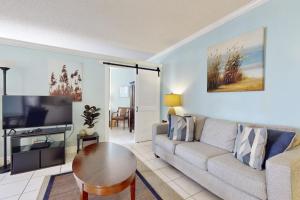 Gorgeous beach home with pool hot tub W&D central AC & partial ocean views