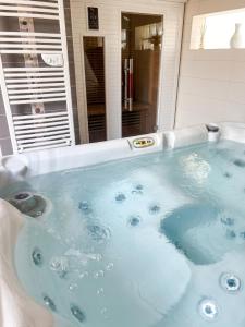 Appartement charmant à La Ferrière-aux-Étangs avec jacuzzi - 42 m²