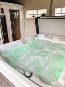 Appartement charmant à La Ferrière-aux-Étangs avec jacuzzi - 42 m²