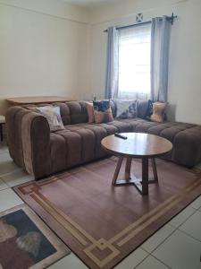 Cozy 2 BR with 3 Beds, AC & Hot Shower at Buxton Point Apartments Off RG Road Gate A