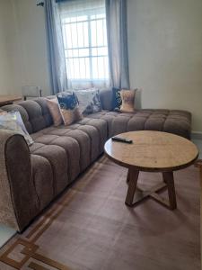 Cozy 2 BR with 3 Beds, AC & Hot Shower at Buxton Point Apartments Off RG Road Gate A