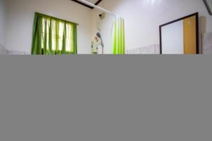 OYO 814 Lauriens Budget Hotel