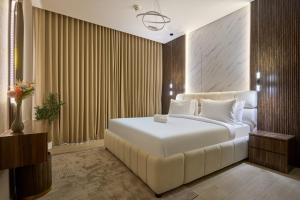 STAY BY LATINEM Luxury 2BR plus maids room Holiday Home CGA 0811