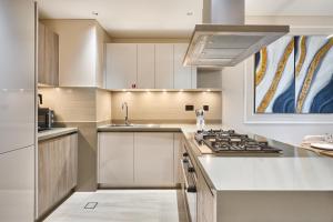 STAY BY LATINEM Luxury 2BR plus maids room Holiday Home CGA 0811