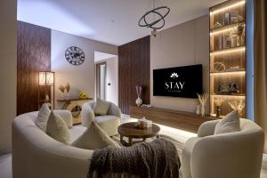 STAY BY LATINEM Luxury 2BR plus maids room Holiday Home CGA 0811