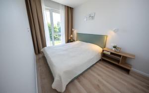 Bangų apartamentai su šildomu baseinu