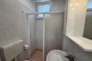 Cozy apartment with private garden in Bibione