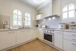 Vacalm Villa Judit - Beachfront Villa with Pool, Spa, BBQ, Fire Pit & Mini Golf