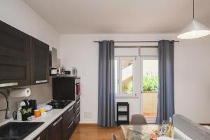 Casa REMì - Appartamento con terrazzo privato nel centro di Porto Torres
