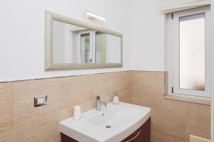 Casa REMì - Appartamento con terrazzo privato nel centro di Porto Torres