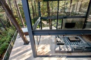 Architectural glass masterpiece villa in Avandaro Forest