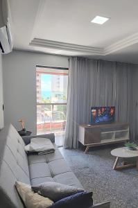 Flat com Piscina na Beira Mar