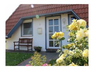 Holiday home in Wremen with swimming pool