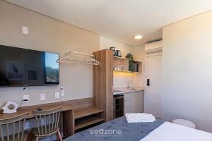 Studio em Cond. c Garagem e Vista Cid. UST0508