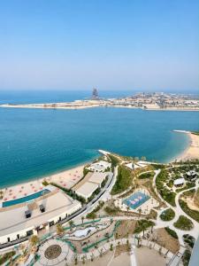 Luxury Sea view 2BR - Infinity Pool -Beach - Lusail