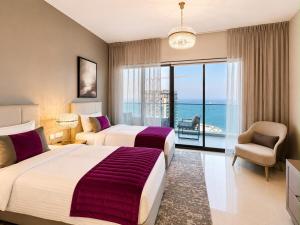 Luxury Sea view 2BR - Infinity Pool -Beach - Lusail