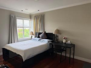 A quiet independent entrance suite on second floors with private bathroom close to YVR
