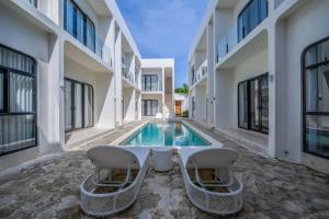 Chic 1BR Apt Near Nelayan Reef