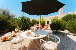 TRULLI FIORI DI MANDORLO 6, Emma Villas