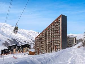 Appartement charmant à Les Menuires, 36 m², vue montagne.