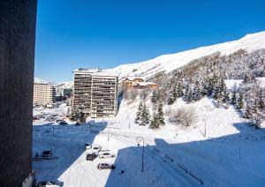Appartement charmant à Les Menuires, 36 m², vue montagne.