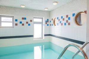Familieboerderij met privé binnenzwembad en sauna | 10 personen