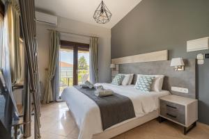 Meliton Inn Hotel & Suites by the beach