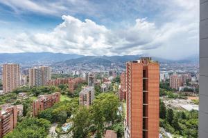 El Tesoro 1BR Coworking, Rooftop & Market AC