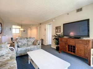 Beachfront with a pool at Ocean Trillium Condo ~ 101