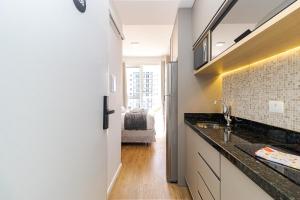 Apartamento 1308 - Manhattan Tower · Studio no centro p3 | Sacada fechada, Wi-Fi & AC