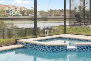 Themed 6BR, Pool, Spa, Lakefront Windsor Hills