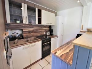Modernly furnished double bungalow with terrace in the Mirow holiday park