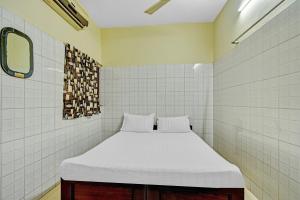 Hotel O Dream Palace Guest House Near Marina Beach