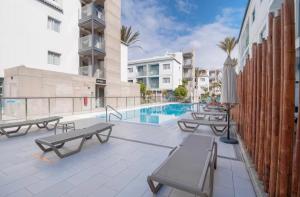 Charming apartment in a building with a pool and terrace