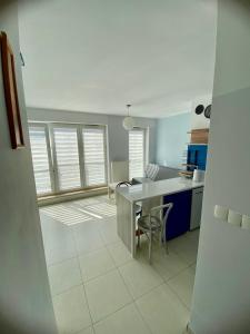 Rodzinny Apartament z parkingiem - 8 min spacerem do plaży