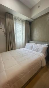 A cozy 1BR by Fern at Grass Residences