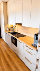 Złota Plaża Apartament Kwiecisty z widokiem na jezioro