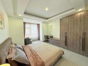 Spacious 2BR Apt 2 Kings bed near TTP area